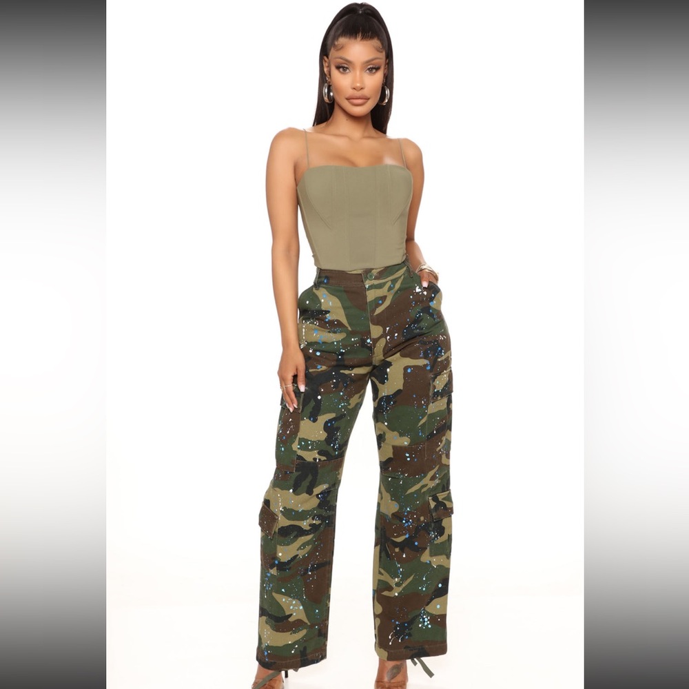 Brand new with tags, camouflage cargo style pants with paint splatter